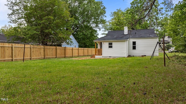 306 Coleman St, Oxford, NC 27565 - back of property featuring crawl space and a chimney