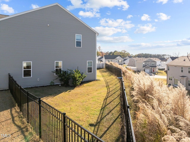 view of property exterior with a residential view
