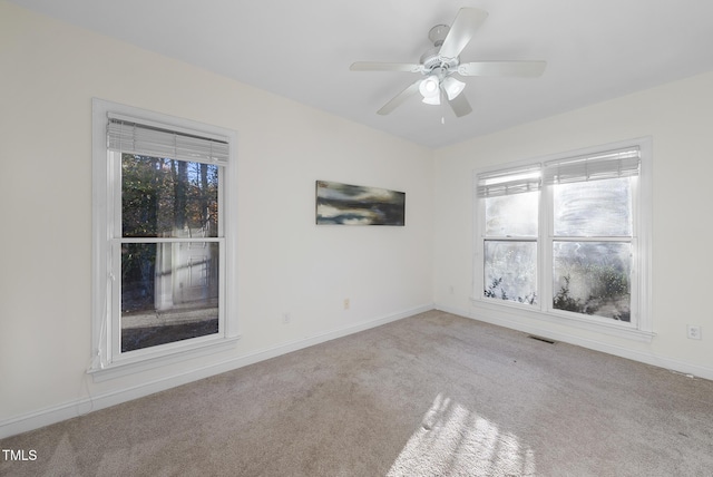 50 Tyler Ct, Henderson, NC 27537 - empty room featuring carpet floors, baseboards, and ceiling fan