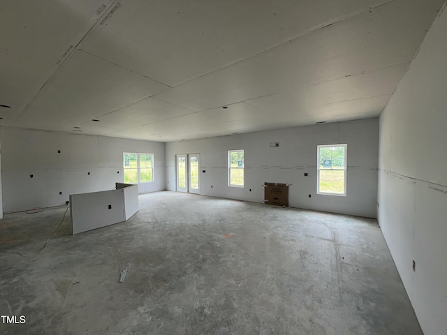 215 Creeks Edge Dr, Pikeville, NC 27863 - unfurnished living room with concrete floors