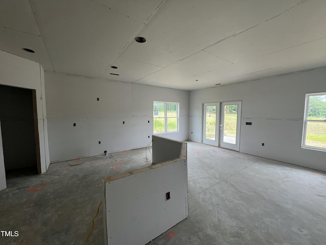 215 Creeks Edge Dr, Pikeville, NC 27863 - unfurnished room with plenty of natural light and unfinished concrete flooring