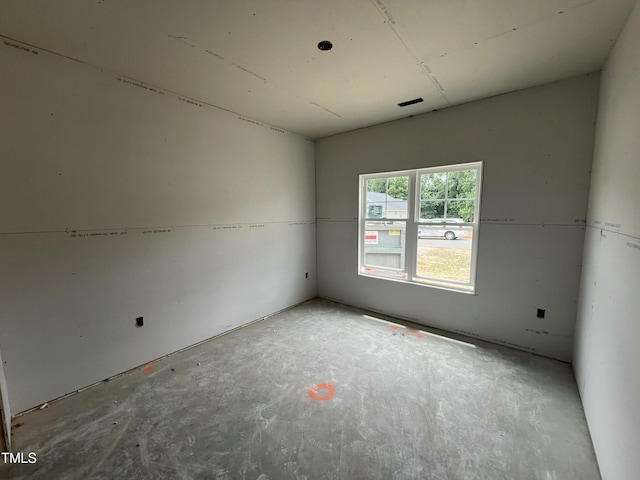 215 Creeks Edge Dr, Pikeville, NC 27863 - empty room with unfinished concrete flooring