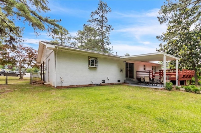 rear view of property with brick siding, a patio area, crawl space, a deck, and entry steps