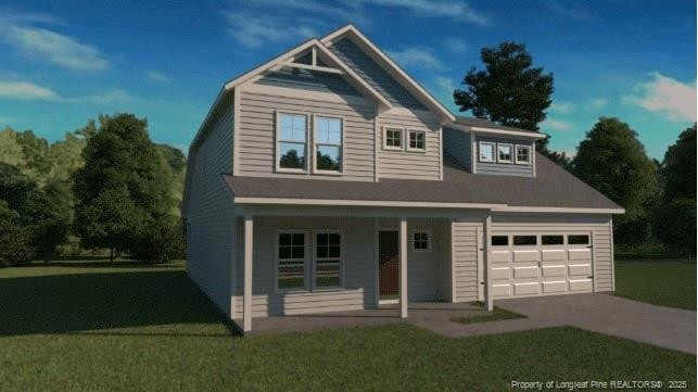 view of front of home with covered porch, driveway, a front lawn, and a garage