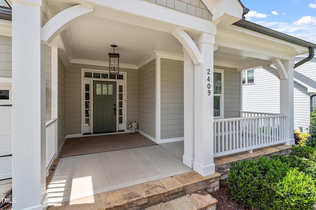 property entrance featuring a porch