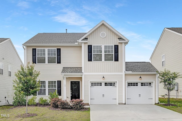 69 Curling Creek Dr Unit I286, Clayton, NC 27527 - traditional home featuring driveway, board and batten siding, roof with shingles, and a garage