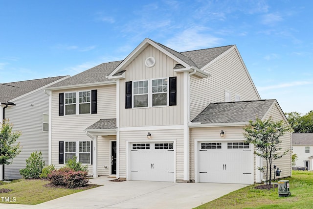 69 Curling Creek Dr Unit I286, Clayton, NC 27527 - traditional home featuring concrete driveway, board and batten siding, a shingled roof, and a front lawn