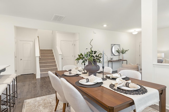69 Curling Creek Dr Unit I286, Clayton, NC 27527 - dining room with stairway, wood finished floors, recessed lighting, and baseboard heating