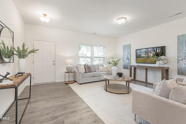 69 Curling Creek Dr Unit I286, Clayton, NC 27527 - living area with wood finished floors and baseboards