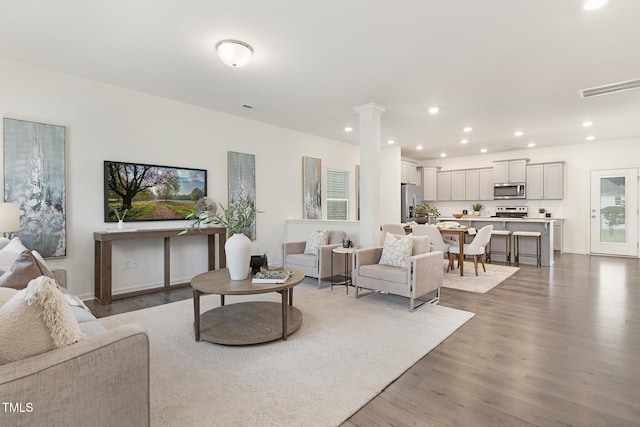 69 Curling Creek Dr Unit I286, Clayton, NC 27527 - living room featuring wood finished floors and recessed lighting