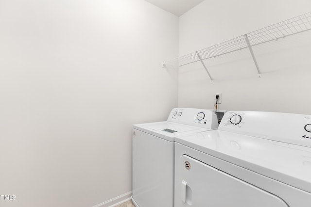 69 Curling Creek Dr Unit I286, Clayton, NC 27527 - washroom featuring washing machine and clothes dryer and baseboards