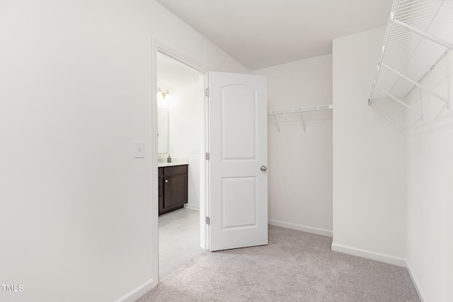 69 Curling Creek Dr Unit I286, Clayton, NC 27527 - walk in closet with light colored carpet