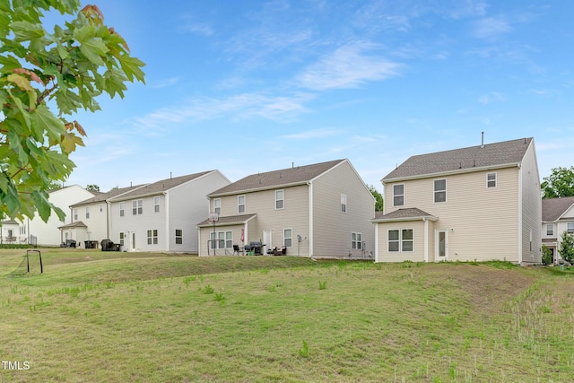 69 Curling Creek Dr Unit I286, Clayton, NC 27527 - rear view of property with a residential view and a lawn