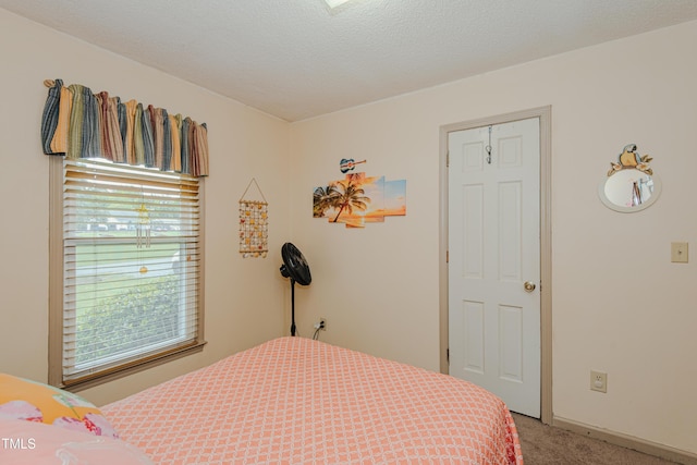 bedroom featuring light colored carpet
