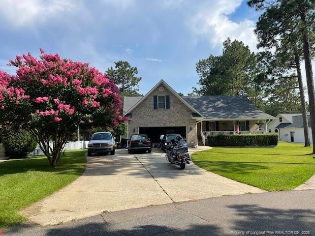 49 Pebble Beach Pt, Sanford, NC 27332 - view of front of property with driveway and a front lawn