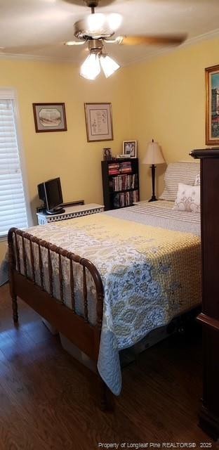 49 Pebble Beach Pt, Sanford, NC 27332 - bedroom with dark wood-style flooring, ornamental molding, and ceiling fan