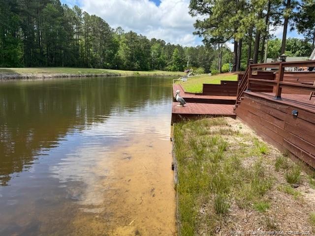 49 Pebble Beach Pt, Sanford, NC 27332 - dock area with a wooded view and a water view