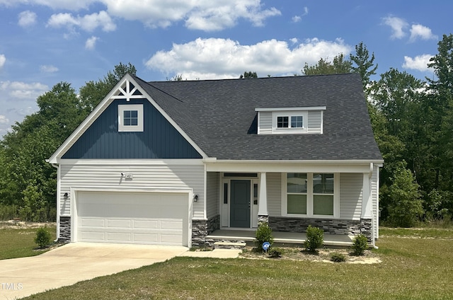 craftsman house with concrete driveway, covered porch, and stone siding