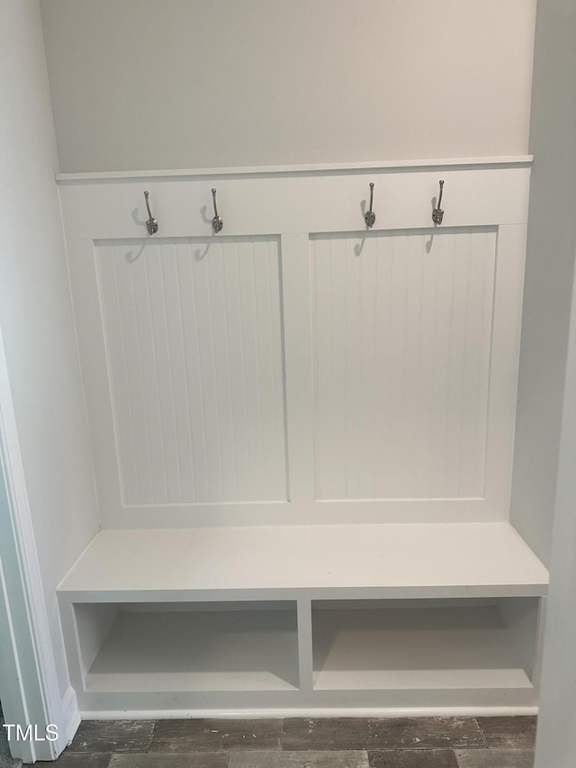 mudroom with wood finished floors