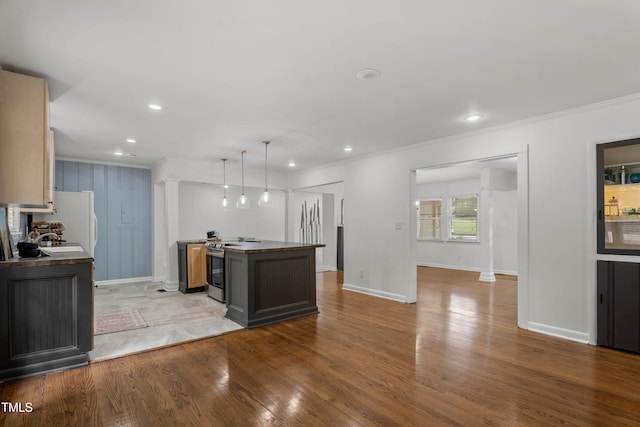 334 Westview Dr, Fayetteville, NC 28303 - kitchen featuring ornamental molding, wood finished floors, baseboards, recessed lighting, and a sink