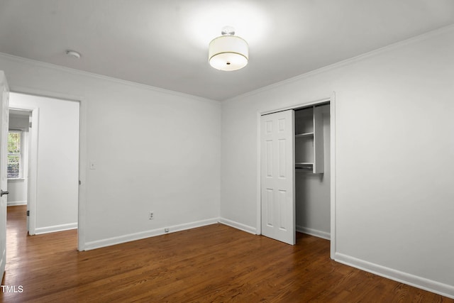 334 Westview Dr, Fayetteville, NC 28303 - unfurnished bedroom with crown molding, baseboards, wood finished floors, and a closet