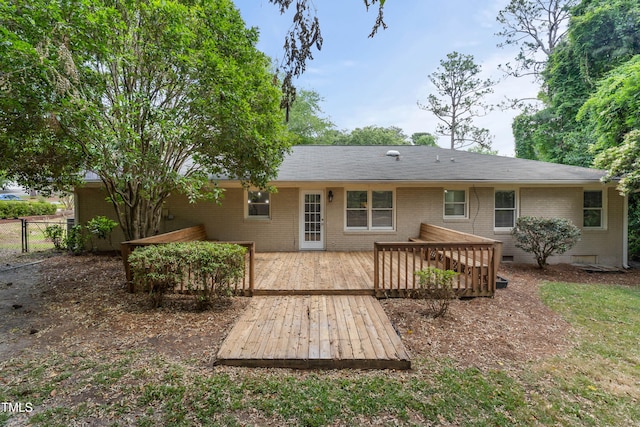 334 Westview Dr, Fayetteville, NC 28303 - back of house with brick siding, crawl space, a deck, and fence