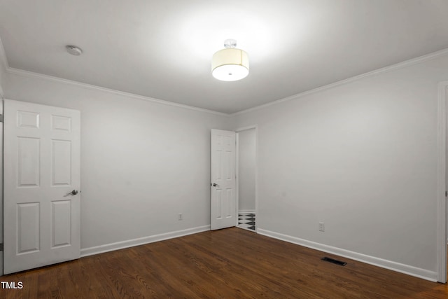 334 Westview Dr, Fayetteville, NC 28303 - spare room with a smoke detector, ornamental molding, wood finished floors, and baseboards