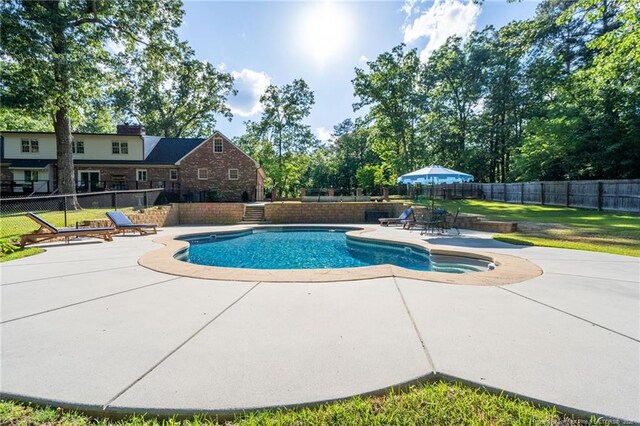 view of pool with a patio area