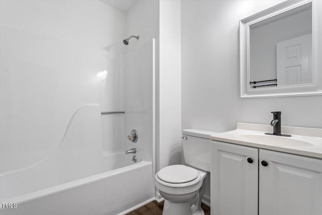 bathroom with toilet, vanity, shower / bath combination, and wood finished floors
