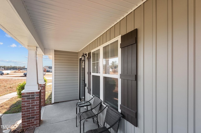 view of patio featuring a porch