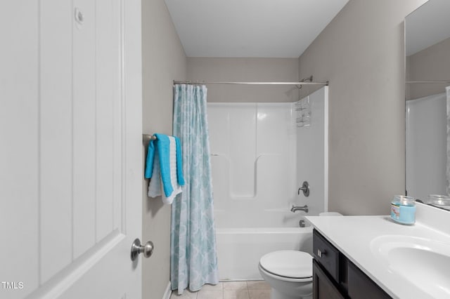 full bathroom with toilet, vanity, shower / bath combo, and tile patterned flooring