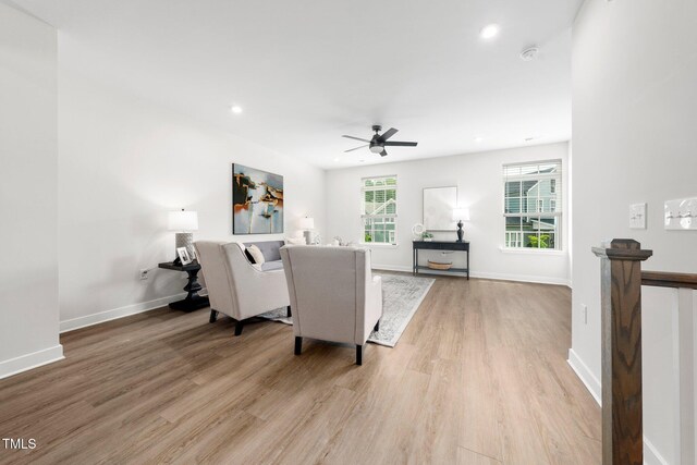 1437 Newpoint Dr, Durham, NC 27713 - living area featuring a ceiling fan, light wood finished floors, baseboards, and recessed lighting