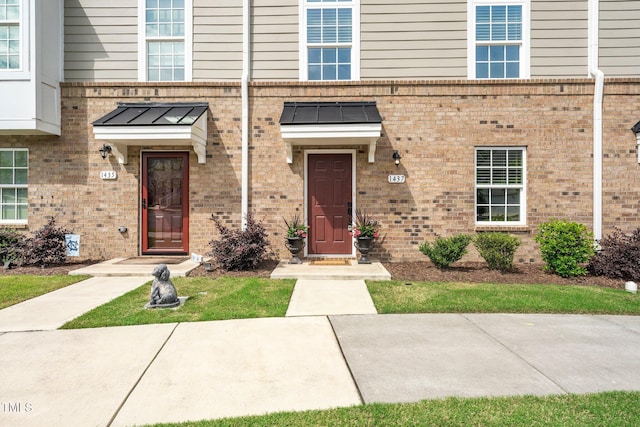 1437 Newpoint Dr, Durham, NC 27713 - property entrance with brick siding
