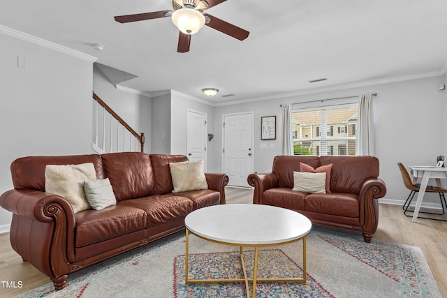 100 Stratford Lakes Dr Unit 361, Durham, NC 27713 - living room featuring light wood-style floors, a ceiling fan, stairway, crown molding, and baseboards