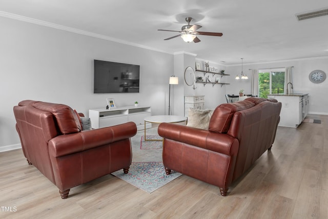 100 Stratford Lakes Dr Unit 361, Durham, NC 27713 - living room featuring light wood-style floors, a ceiling fan, ornamental molding, and baseboards