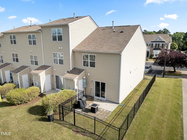 100 Stratford Lakes Dr Unit 361, Durham, NC 27713 - rear view of house with a shingled roof, a patio area, and a garage