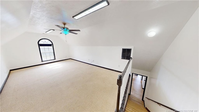 2500 Forest Lodge Dr, Fayetteville, NC 28306 - additional living space with vaulted ceiling, baseboards, and ceiling fan