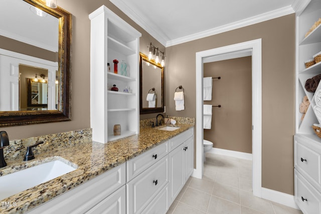 full bath featuring baseboards, toilet, tile patterned floors, ornamental molding, and double vanity