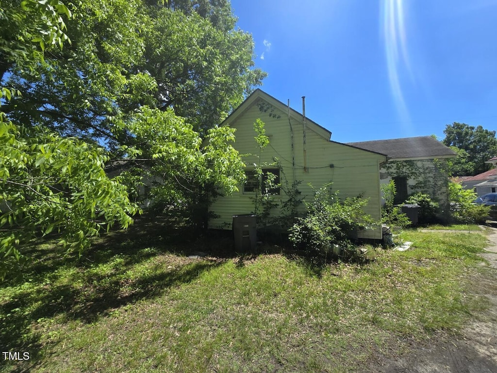 824 Beal St, Rocky Mount, NC 27804 - view of side of home featuring a lawn