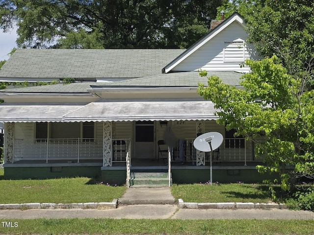 824 Beal St, Rocky Mount, NC 27804 - view of front of property with covered porch and roof with shingles