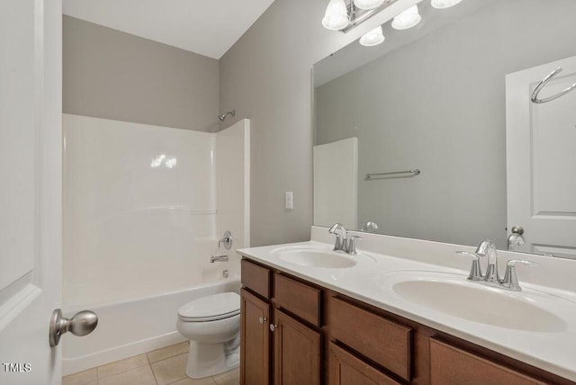 bathroom featuring tile patterned flooring, toilet, double vanity, and bathing tub / shower combination