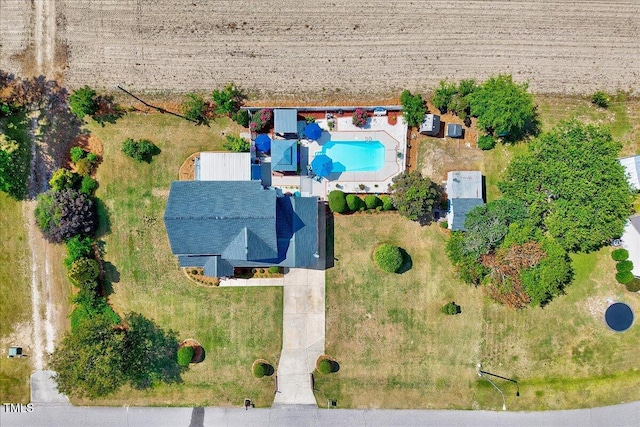 aerial view of property's location featuring a pool