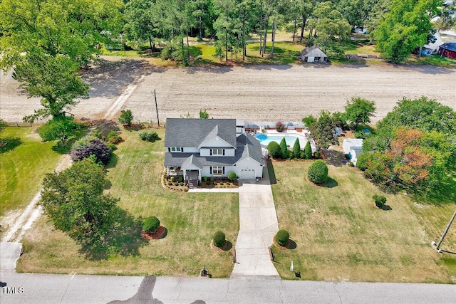 view of subject property featuring a pool area