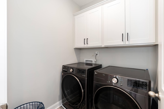 76 Freewill Pl, Raleigh, NC 27603 - clothes washing area with cabinet space, separate washer and dryer, and baseboards