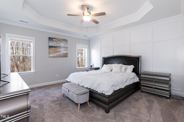 76 Freewill Pl, Raleigh, NC 27603 - carpeted bedroom with a raised ceiling, ornamental molding, and ceiling fan