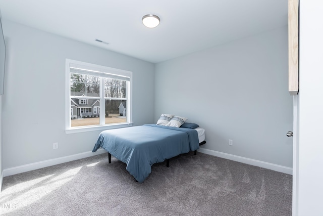 76 Freewill Pl, Raleigh, NC 27603 - bedroom with baseboards and carpet floors