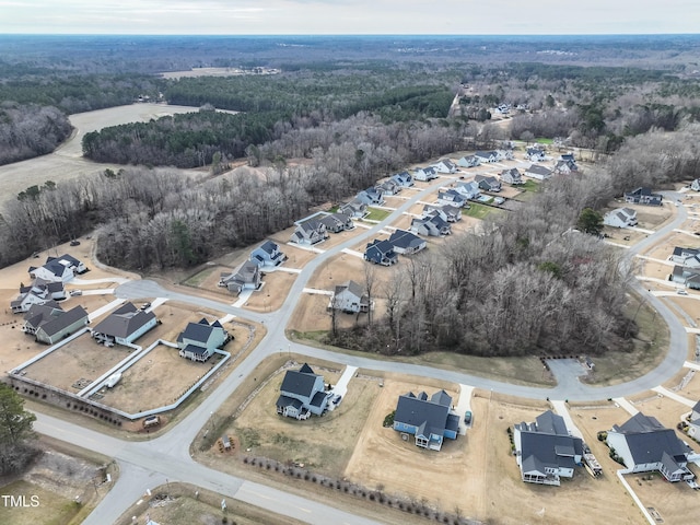 76 Freewill Pl, Raleigh, NC 27603 - aerial overview of property's location with a forest and nearby suburban area