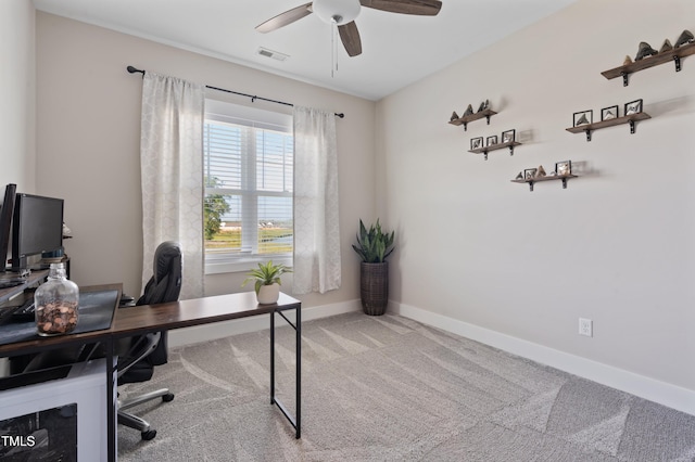 home office featuring ceiling fan, carpet floors, and baseboards