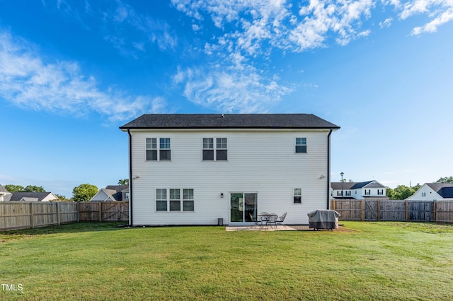 back of house with a patio