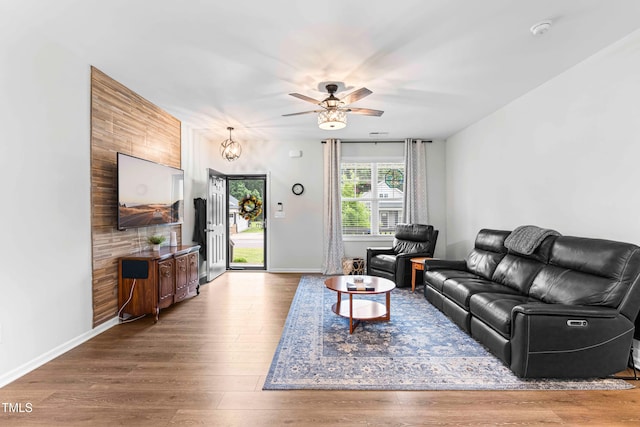 173 Longbow Dr, Middlesex, NC 27557 - living area featuring a ceiling fan, wood finished floors, and baseboards